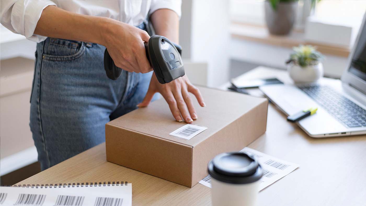 Hardware Integration - Barcode Scanner Woman using a barcode scanner